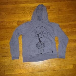 light blue hoodie with detailed tree design from cotton on size medium